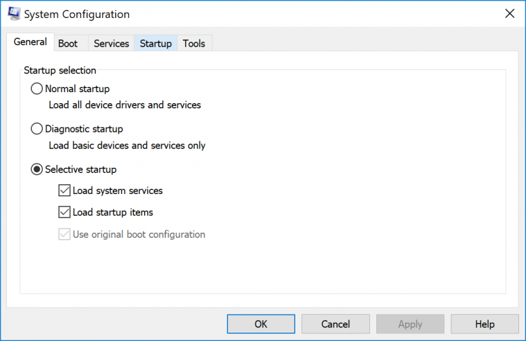 Pada opsi Selective Startup, centang Load Startup Items.
